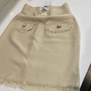 Clara Paris Elegant Cream Skirt with Fringe Detail